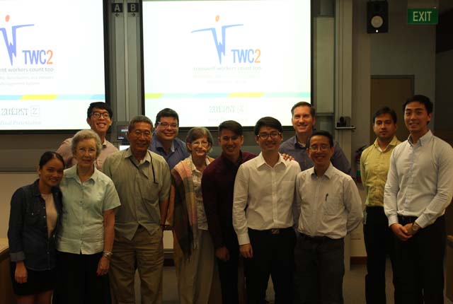 Group photo of Zuerst members, their professors and TWC2 folks after Zuerst's final presentation to their profs.